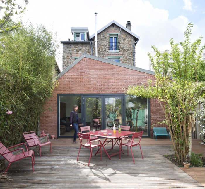 Extension en briques d'une maison en meulière